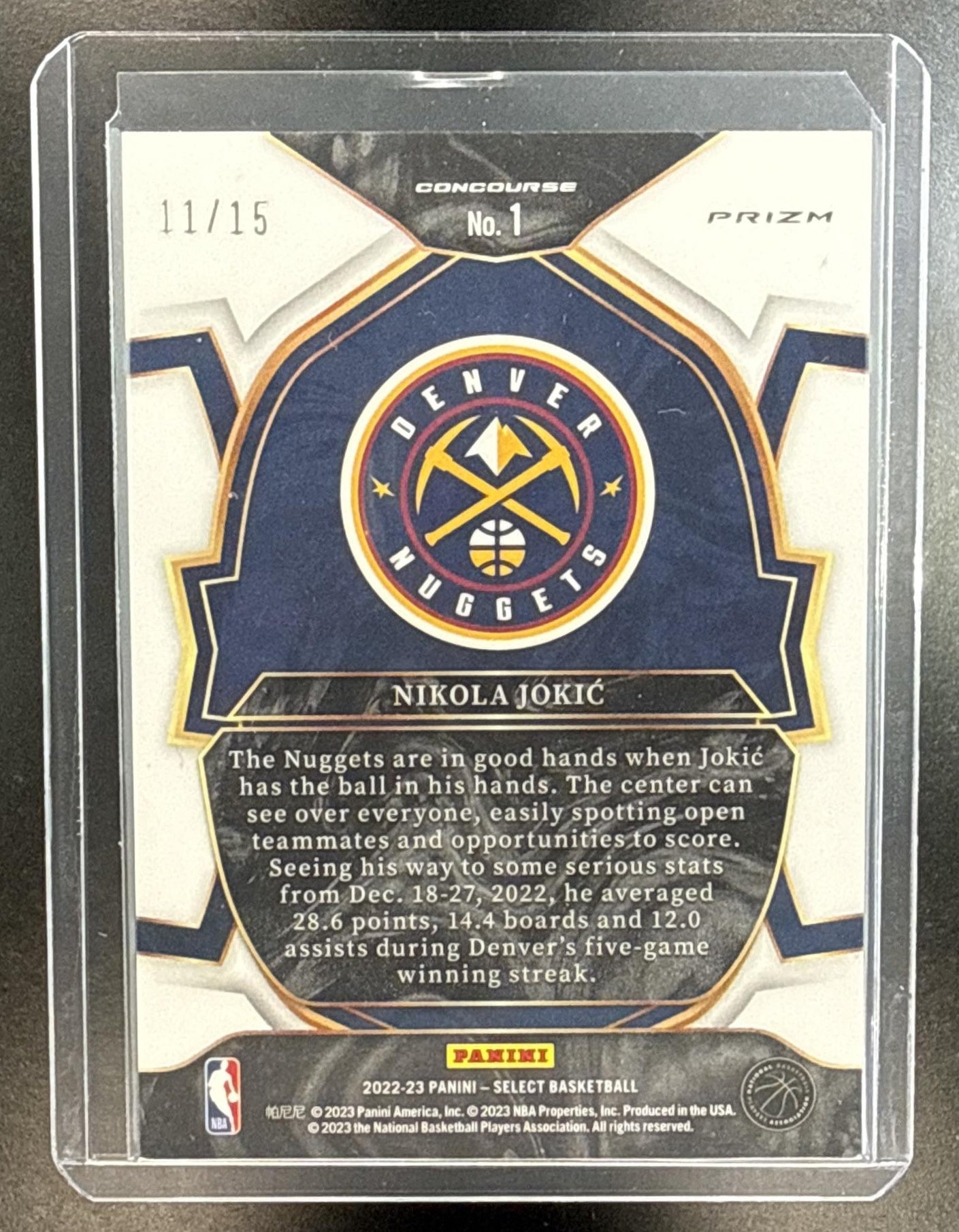 Nikola Jokic Panini Select 2022-23 Neon Orange Pulsar FOTL /15 Denver Nuggets
