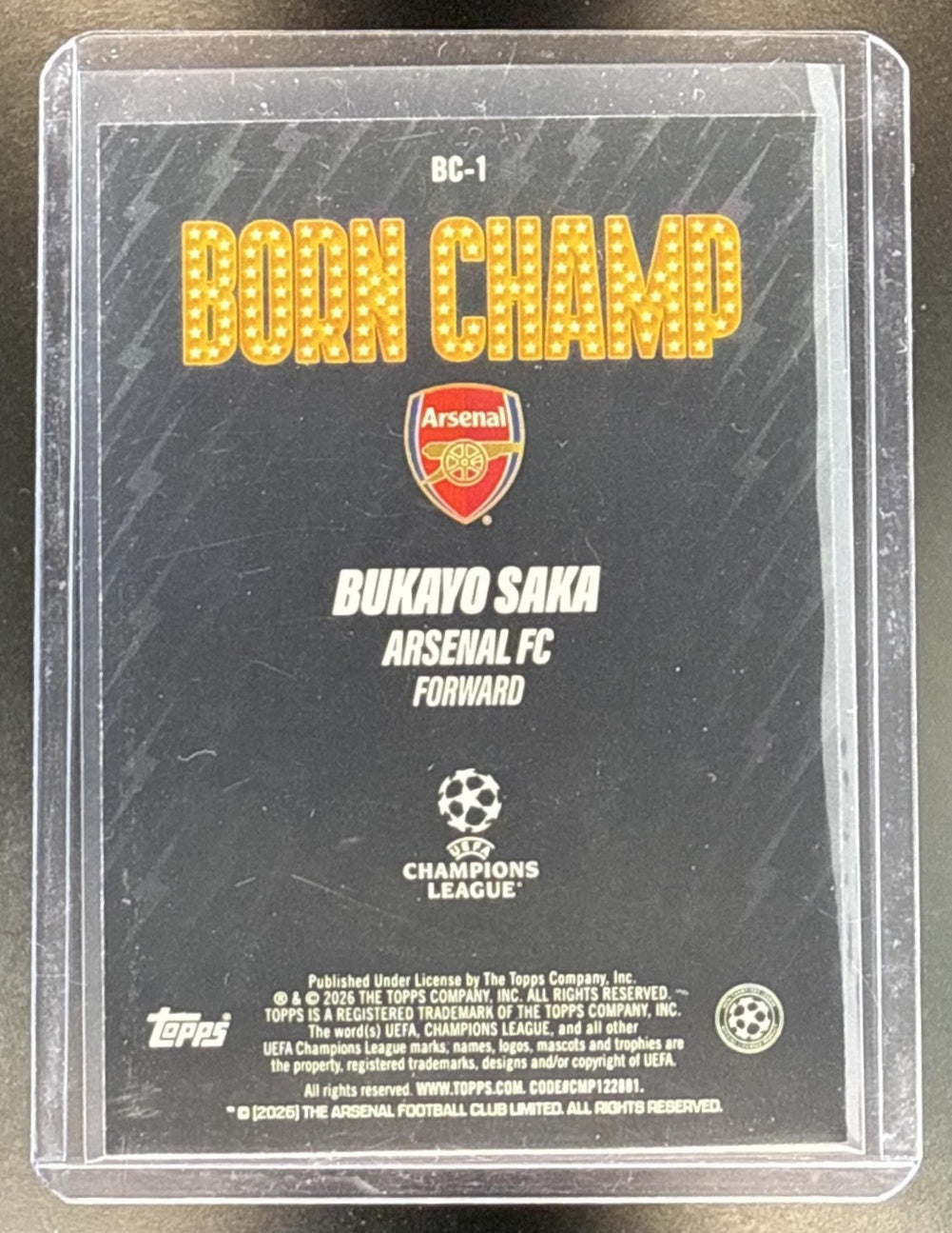 Bukayo Saka Topps UEFA CC 2025-26 Born Champ Orange Foil /25 Arsenal FC