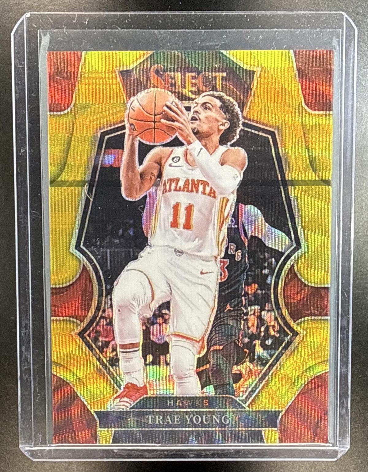 Trae Young Panini Select 2022-23 Gold Wave /10 Premier Level Atlanta Hawks
